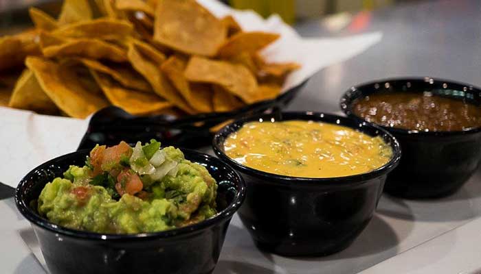 Casa Taco New Mexico Mexican Restaurant homemade guacamole, nacho cheese and salsa served with tortilla chips